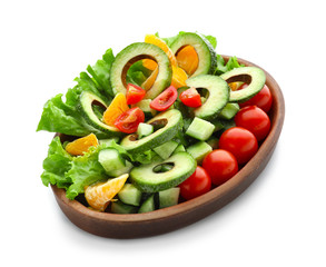 Plate with tasty avocado salad on white background