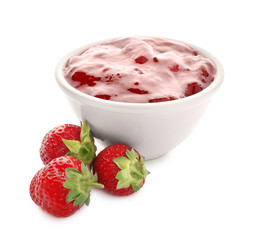 Bowl with tasty strawberry jam on white background