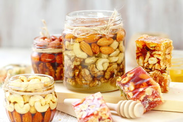 Nuts in honey and sweet marmalade with various nuts