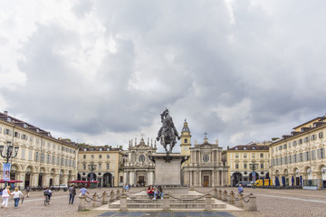 Obraz premium Turin, Italy -June 12, 2018 :Piazza San Carlo square and twin churches of Santa Cristina and San Carlo Borromeo in the Old Town center of Turin, Italy. Turin, San Carlo square, Italy