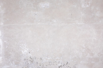 Obraz premium Damaged grey concrete wall exterior background texture