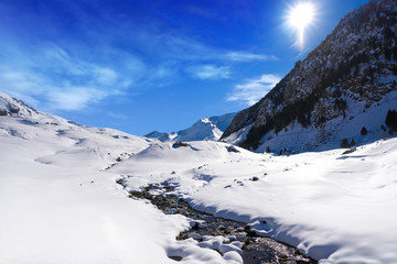 Cerler snow stream in Pyrenees of Huesca Spain