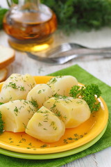 Naklejka na ściany i meble Boiled potatoes with fresh dill and oil