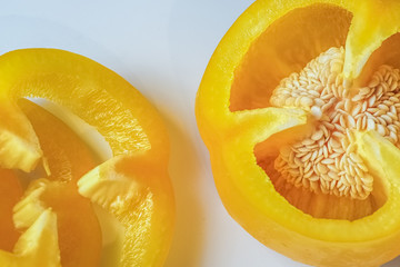 cut yellow pepper isolated on the white background