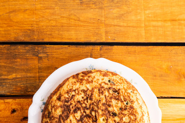 potato omelet on wooden background