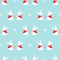 Cute baby rabbits with candy cane hearts and snowflakes seamless pattern on blue background. Winter holidays background. Vector winter design for textile, wrapping paper, fabric, card.