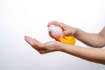 cleansing wash essence, skin care. women hands holding cleansing bottle, beauty and body care concept