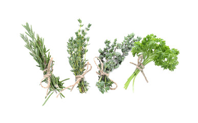 Different fresh herbs on white background