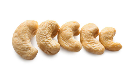 Tasty cashew nuts on white background