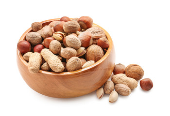 Bowl with various tasty nuts in white background