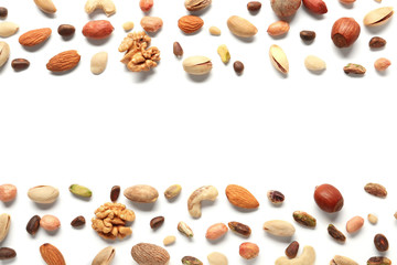 Composition with different nuts on white background