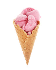 Waffle cone with delicious strawberry ice-cream on white background