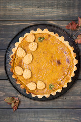 Traditional homemade American pumpkin pie for a holiday
