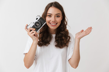 Portrait of an excited young casual brunette woman