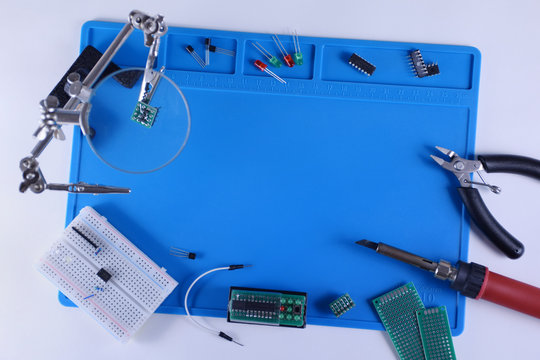 DIY electronics background with copy space in the middle