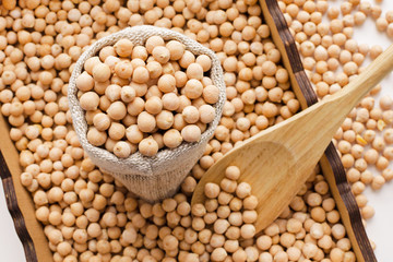 dry raw chickpeas in wooden box