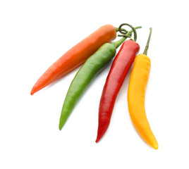 Fresh hot chili peppers on white background