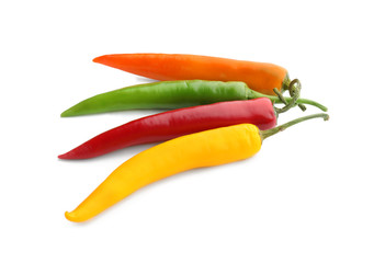 Fresh hot chili peppers on white background