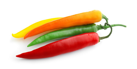 Fresh hot chili peppers on white background