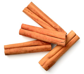 cinnamon sticks isolated on the white background, top view