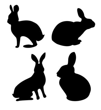 set black silhouettes of hares in different poses. Rabbit Set