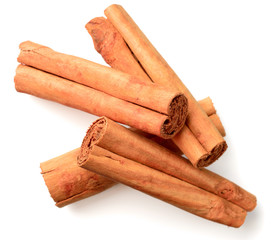 cinnamon sticks isolated on the white background, top view