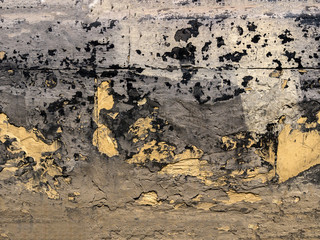 The wall of the old house. Cracks on the surface. Background