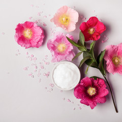 Obraz na płótnie Canvas Natural Cosmetics product, flavored sea salt and flowers