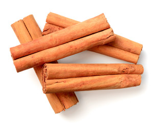 cinnamon sticks isolated on the white background, top view