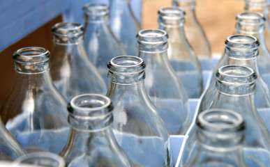 Empty soda glass bottles.