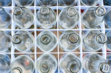 Empty soda glass bottles.