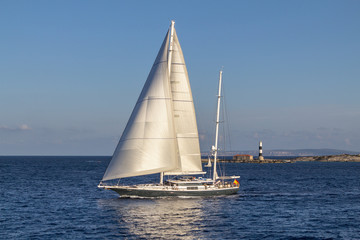 Sailboat sailing in the evening