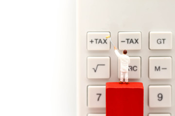 Miniature people : worker  with  Calculator button of tax, business concept.