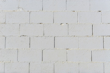 background of white wall of concrete bricks