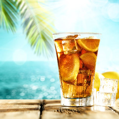 Summer drink of ice tea and palm 