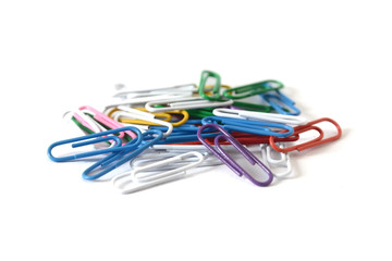 lots of colorful paperclips group with white background