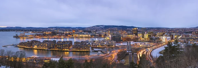 Zelfklevend Fotobehang Oslo night aerial view city skyline panorama at business district and Barcode Project, Oslo Norway © Noppasinw