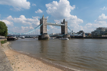 Tower Bridge in London with Thames shoreline