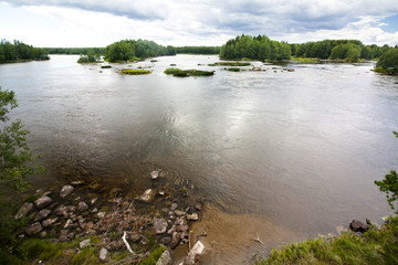 Summer landscape of Kymijoki river waters in Finland.