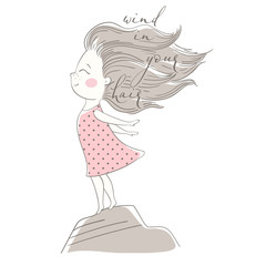 Wind blows hair of cute girl