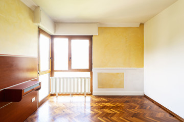 Bedroom with window and radiator