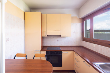 Vintage kitchen with window and table with stools