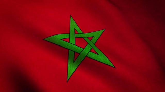 Realistic flag of Morocco waving with highly detailed fabric texture.