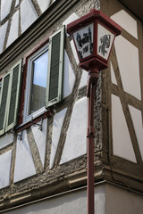 Fototapeta na wymiar Laterne vor einem alten Fachwerkhaus in Heppenheim, einer Weinregion an der Bergstrasse in Hessen