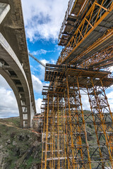 Construction of a bridge with cranes in the expansion works of the Madrid - Segovia - Valladolid highway. Fundamental axis of communications