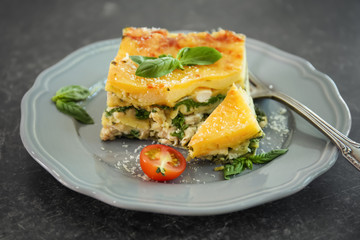Lasagna with spinach on table