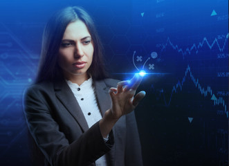 The concept of business, technology, the Internet and the network. A young entrepreneur working on...