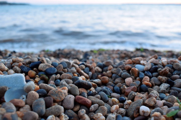 Small pebbles at the beach by the sea