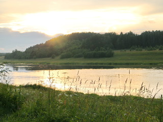 sunset over the river in summer