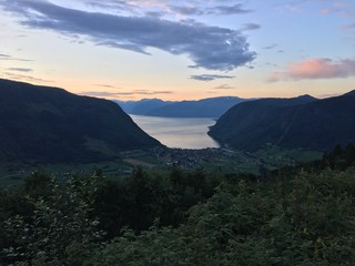 Village near a lake and surrounded by mountains in beautiful Norway